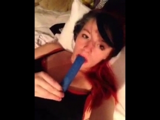 red haired pussy indulges in blue dildo